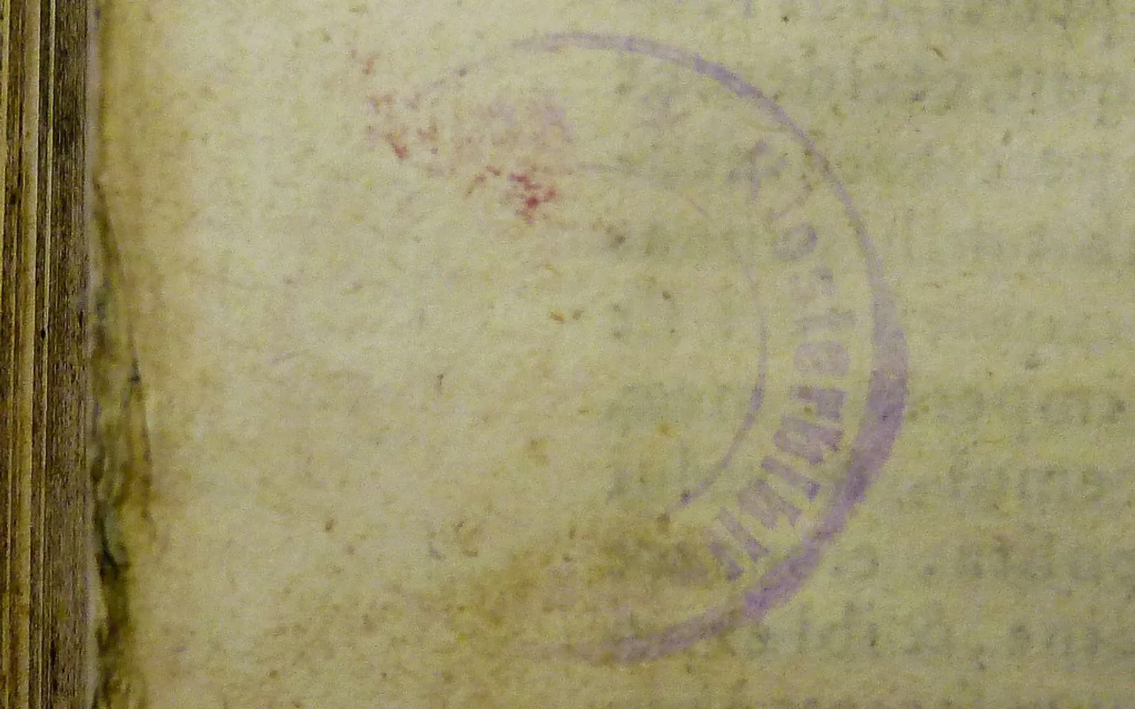 Partially illegible stamp of a monastery library -- possibly that of Kloster Kreuzberg, an observant Franciscan house near Bischofsheim, Bavaria, Germany