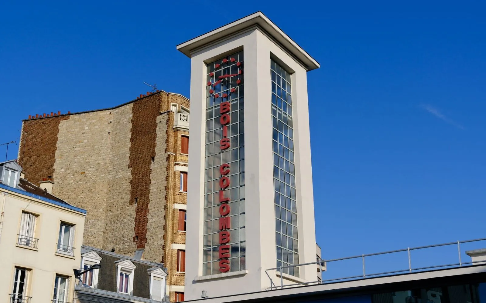 A view of the Bois-Colombes station entrance showcasing unique modern architecture.