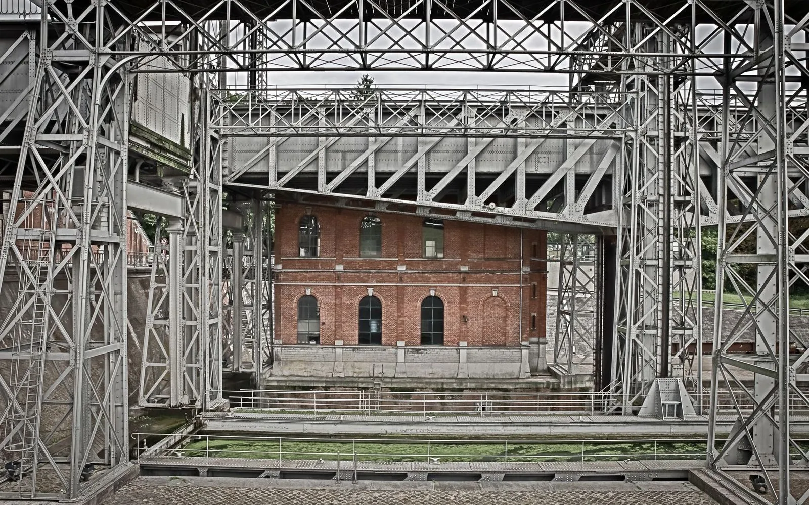 Historic industrial site with steel framework in La Louvière, Belgium.