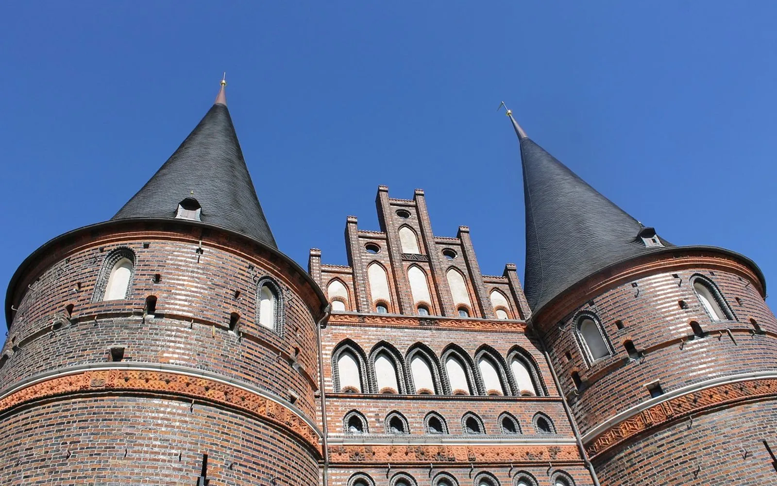 hanseatic city of lübeck, germany, holsten gate is more than 300 years old